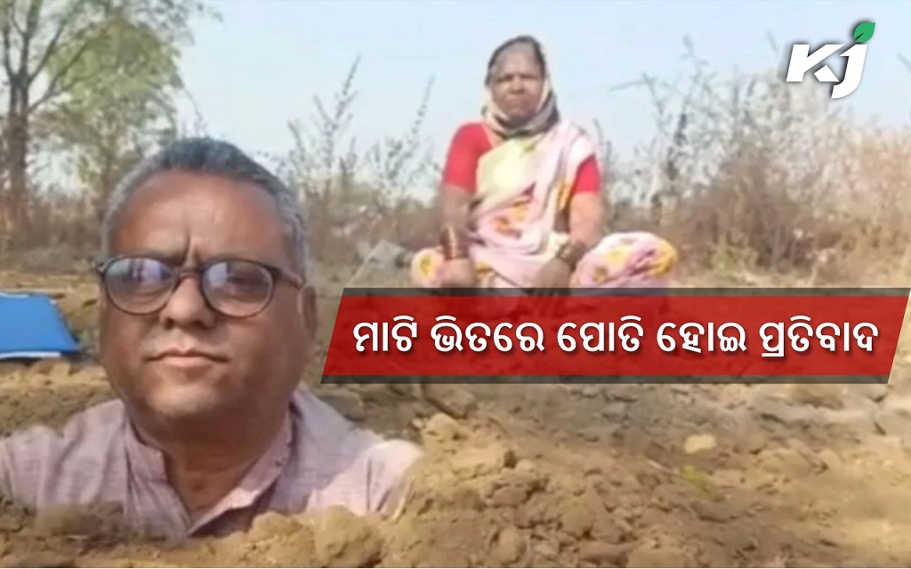 farmer buries himself in mud to protest